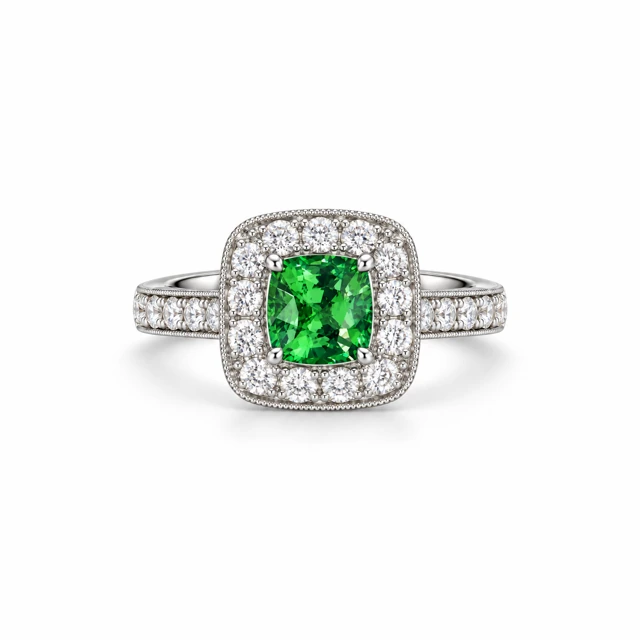 An emerald surrounded by small diamonds, with more diamonds along the band.