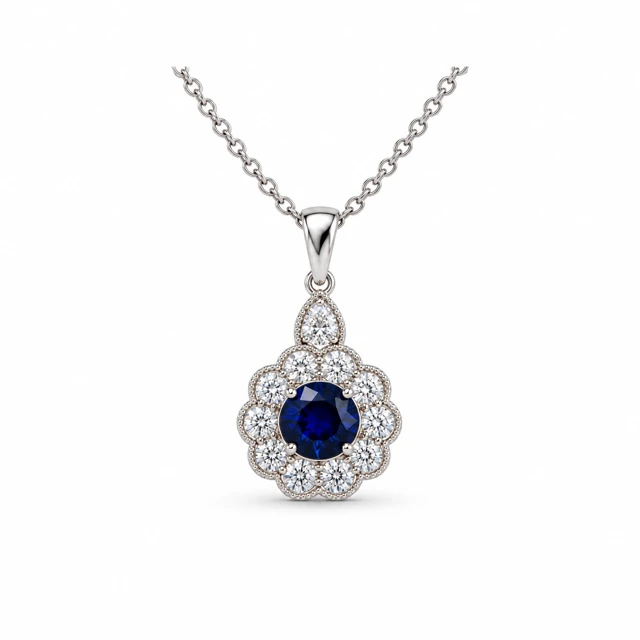 A blue sapphire surrounded by diamonds in a flower shape.