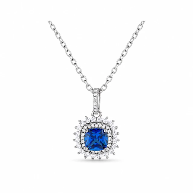 A rectangular blue sapphire surrounded by diamonds in a star-like pattern.